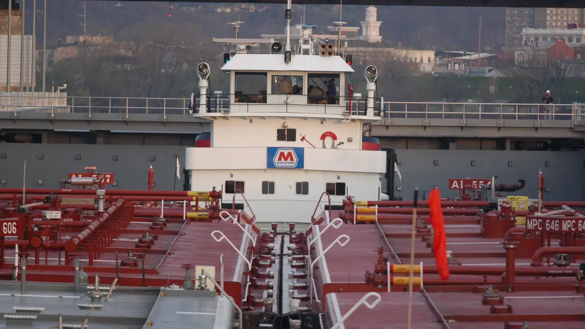 A loaded tank barge tow inside a lock chamber at McAlpine Locks and Dam, Louisville